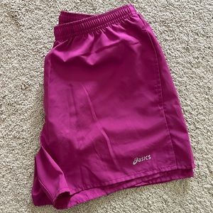 ASICS pink athletic shorts size medium never been worn!